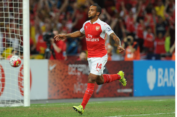 Theo Walcott wants to remain at the Emirates and feels that Arsenal can win the Premiership