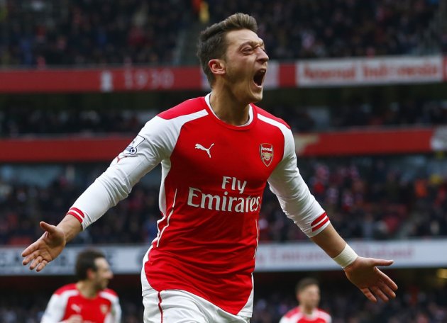 Mesut Ozil is an Arsenal player and he is going NOWHERE says Wenger